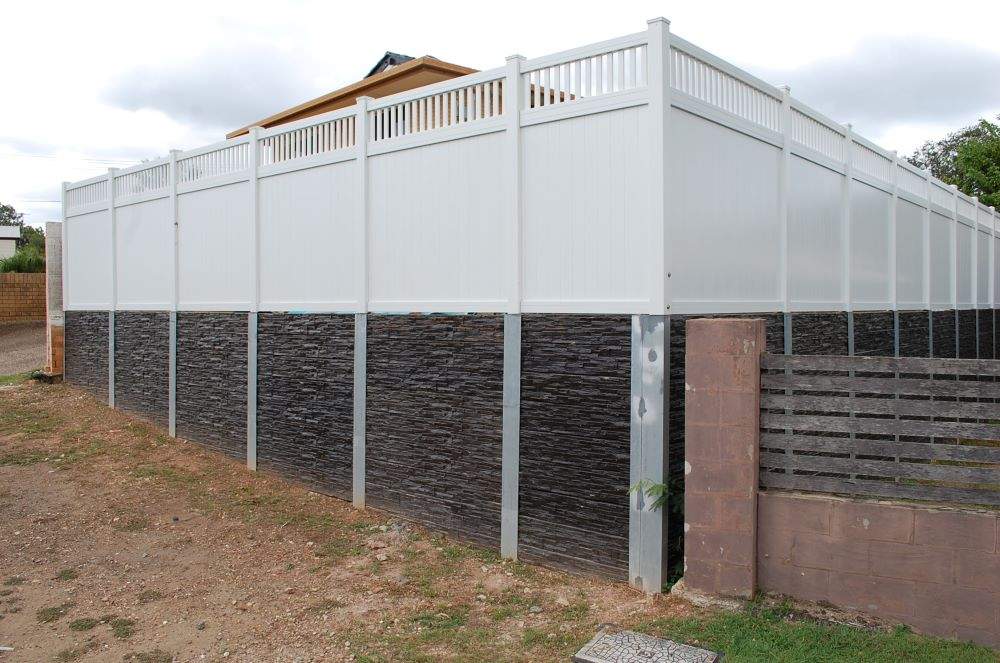 Retaining Wall White Fence Installation